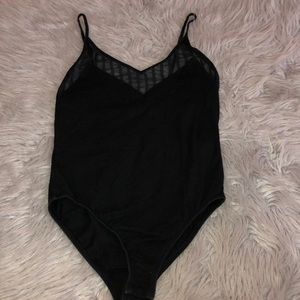 Black, low cut body suit
